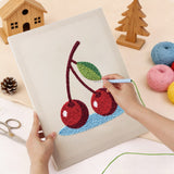 Punching the Cherries on Blue design with the punch needle