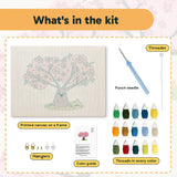 What is in the Cherry Blossom Tree kit: printed canvas, punch needle, threader, threads, color guide and hangers