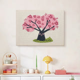 Finished Cherry Blossom Tree punch needle canvas on a wall