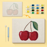 Cherry Pair canvas before and after punching, with the threads and tools