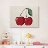 Finished Cherry Pair punch needle canvas on a wall