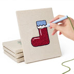 Hand punching one of the Christmas Morning mini canvases