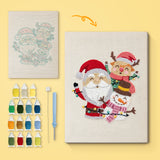 Christmas Pals canvas before and after punching, with the threads and tools