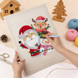 Punching the Christmas Pals design with the punch needle