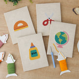 The four finished Classroom Globe mini canvases laid out on a table