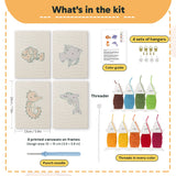 What is in the Clownfish Reef set: 4 printed canvases, punch needle, threader, threads, color guide and 4 sets of hangers (6 × 8 in (15 × 20 cm) each)