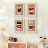 The four Coffee Shop Cups mini canvases on a wall above a shelf