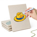 Hand punching one of the Colorful Hats mini canvases