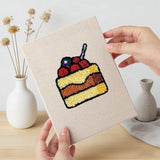 Hand holding a finished Cookie and Cake mini canvas