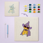 Cool Wizard Cat canvas before and after punching, with the threads and tools