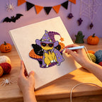 Punching the Cool Wizard Cat design with the punch needle