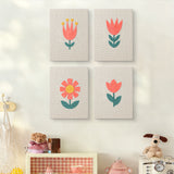 The four Coral Spring Blooms mini canvases on a wall above a shelf