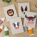 The four finished Cow and Buffalo mini canvases laid out on a table