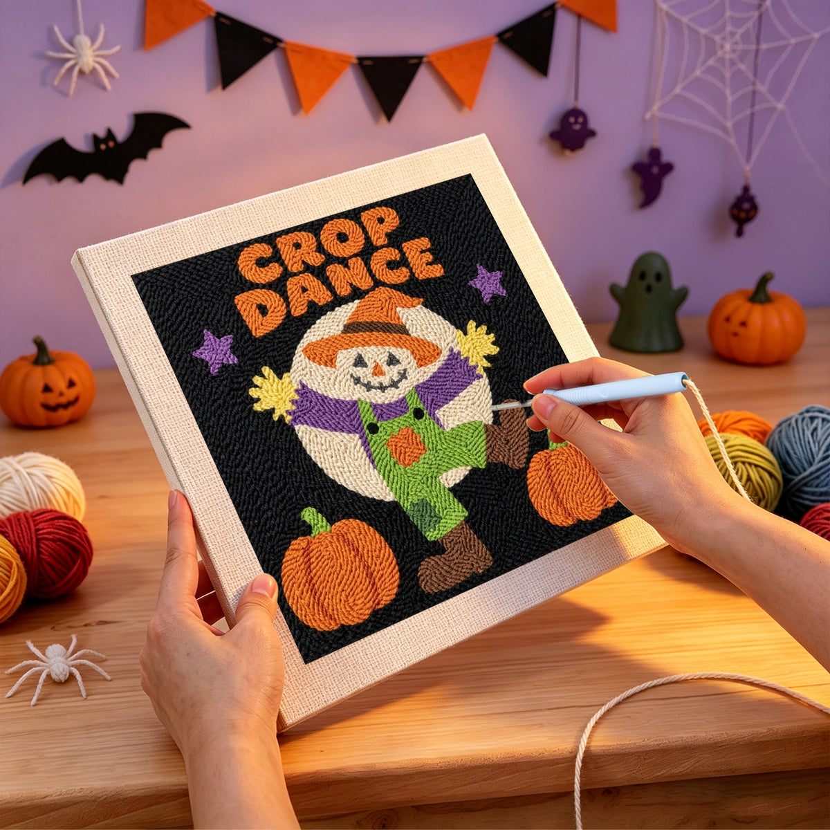 Punching the Crop Dance Scarecrow design with the punch needle