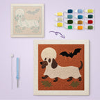 Dachshund Ghost canvas before and after punching, with the threads and tools