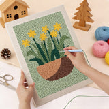 Punching the Daffodil Bowl design with the punch needle