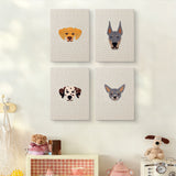 The four Dalmatian and Pals mini canvases on a wall above a shelf