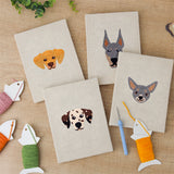 The four finished Dalmatian and Pals mini canvases laid out on a table