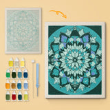 Deep Teal Mandala canvas before and after punching, with the threads and tools
