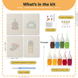 What is in the Desk Essentials set, 8 × 12 in (20 × 30 cm) each: 4 printed canvases, punch needle, threader, threads, color guide and 4 sets of hangers