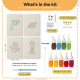 What is in the Dolphin and Squid set: 4 printed canvases, punch needle, threader, threads, color guide and 4 sets of hangers (6 × 8 in (15 × 20 cm) each)