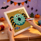 Punching the Donut Spider design with the punch needle