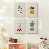The four Dotted Pot Succulents mini canvases on a wall above a shelf