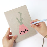 Punching a Dotted Pot Succulents mini canvas with the punch needle