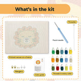 What is in the Dozing Lion kit: printed canvas, punch needle, threader, threads, color guide and hangers