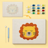 Dozing Lion canvas before and after punching, with the threads and tools