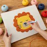Punching the Dozing Lion design with the punch needle