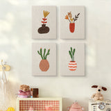 The four Dried Stem Vases mini canvases on a wall above a shelf