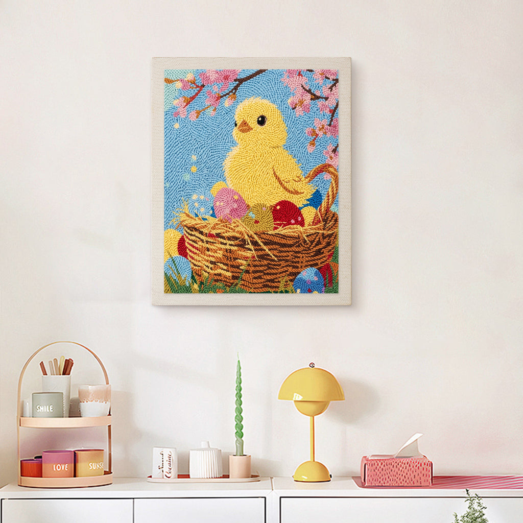 Finished Easter Chick Basket punch needle canvas on a wall