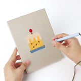 Punching a Easter Table Treats mini canvas with the punch needle