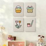 The four Egg Basket Spring mini canvases on a wall above a shelf