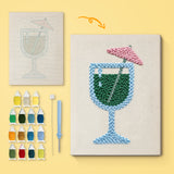 Emerald Cocktail Glass canvas before and after punching, with the threads and tools