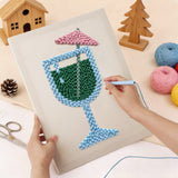 Punching the Emerald Cocktail Glass design with the punch needle