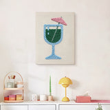 Finished Emerald Cocktail Glass punch needle canvas on a wall