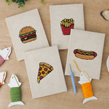 The four finished Fast Food Favorites mini canvases laid out on a table