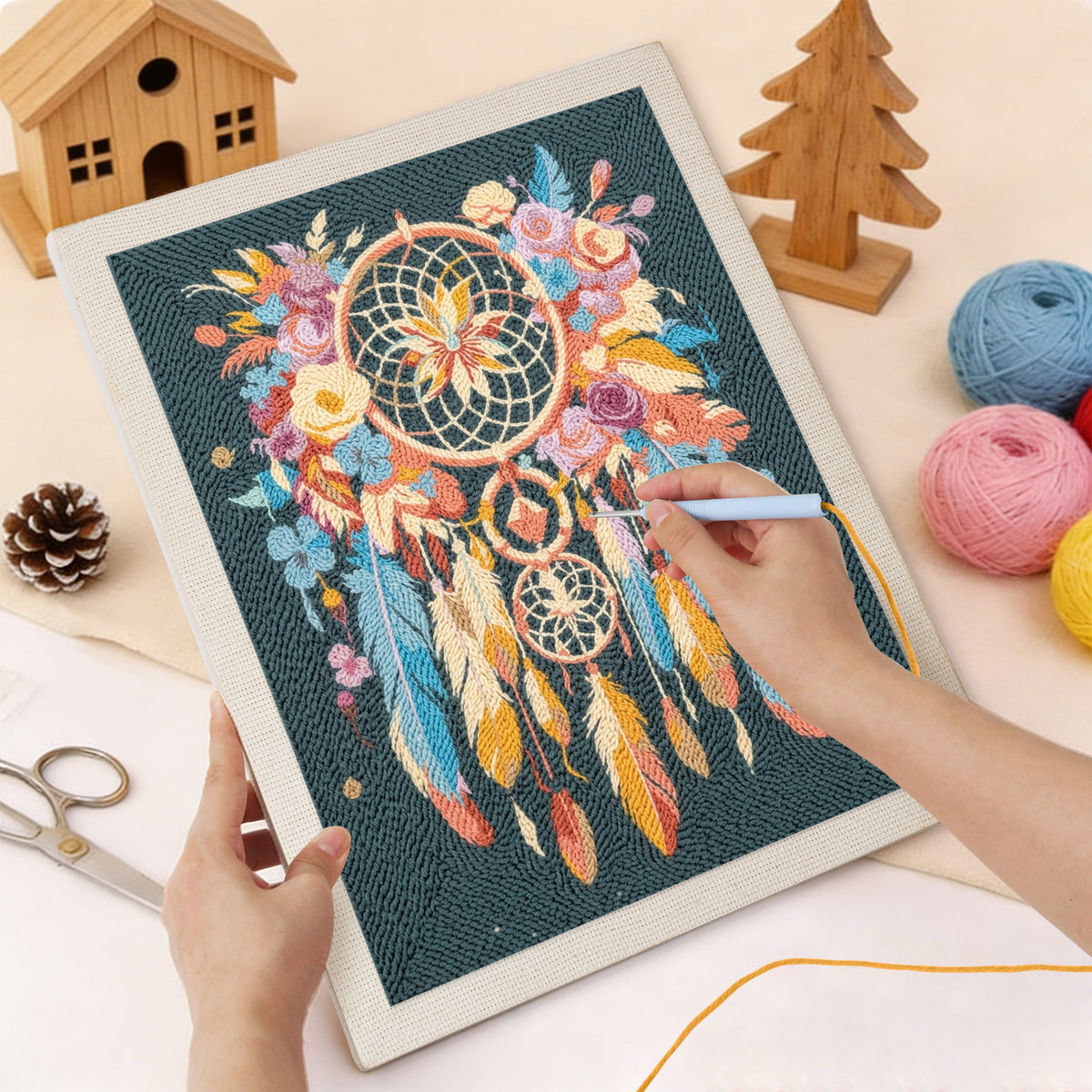 Punching the Feather Dreamcatcher design with the punch needle