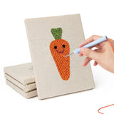 Hand punching one of the Fig and Cauliflower mini canvases