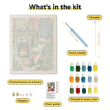 What is in the Fireside Santa kit: printed canvas, punch needle, threader, threads, color guide and hangers