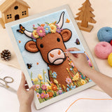 Punching the Flower Crown Cow design with the punch needle