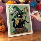 Punching the Flower Hat Witch Cat design with the punch needle