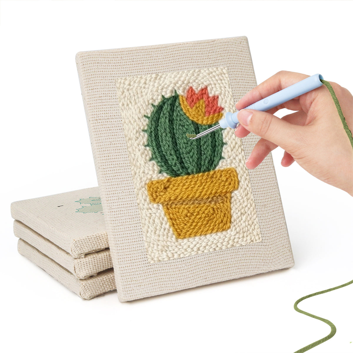 Hand punching one of the Flowering Cactus Pots mini canvases