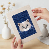 Hand holding a finished Fluffy Pet Portraits mini canvas