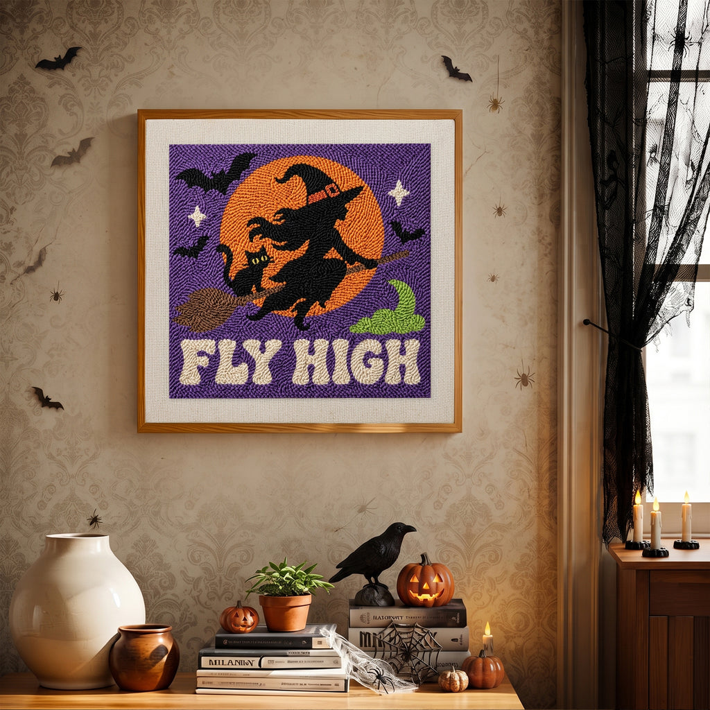 Finished Fly High Witch punch needle canvas on a wall