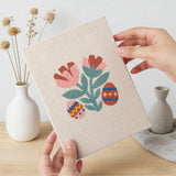 Hand holding a finished Folk Bunny Blooms mini canvas