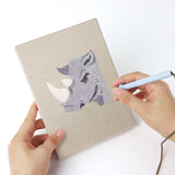 Punching a Fox and Deer mini canvas with the punch needle