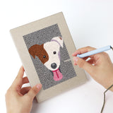 Punching a Frenchie and Bunny mini canvas with the punch needle